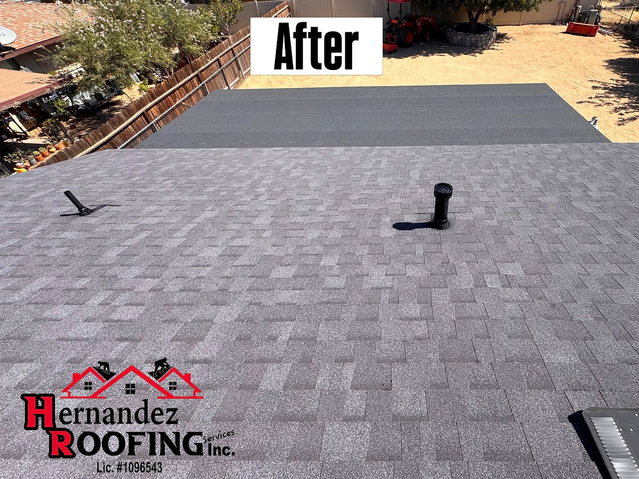 After: new charcoal shingle roof with vents